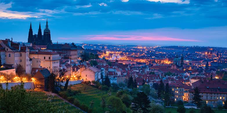 Prague skyline with castle towers at dusk