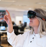 Person adjusting smart glasses