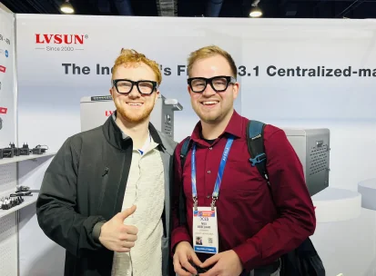 Two VR Expert team members wearing AI glasses at a trade show